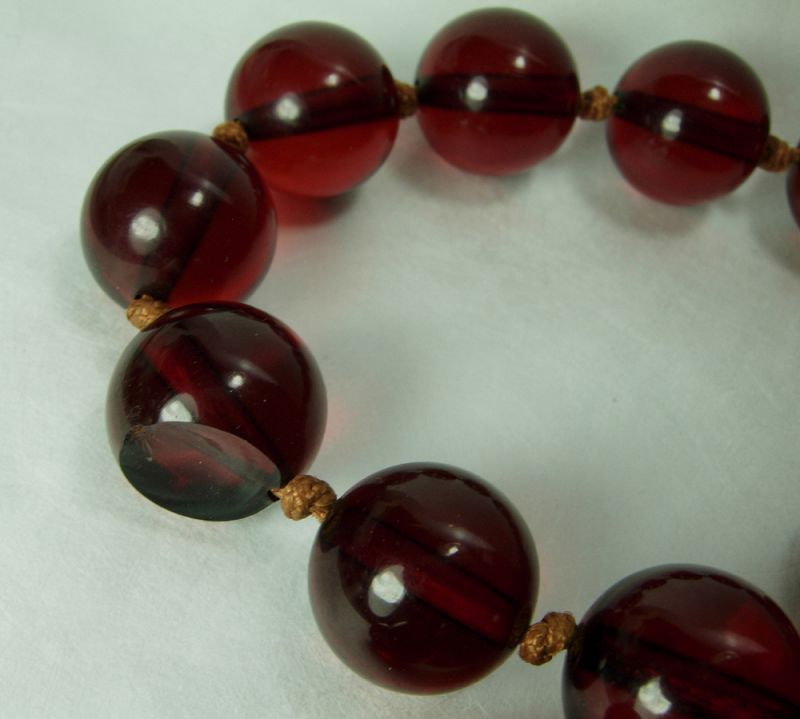 1920s Cherry Amber Bakelite Necklace 146 Grams 63 Inches Hand Knotted