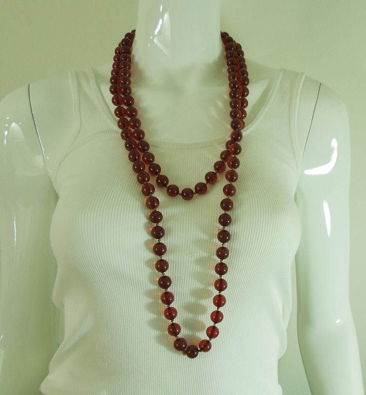 1920s Cherry Amber Bakelite Necklace 146 Grams 63 Inches Hand Knotted