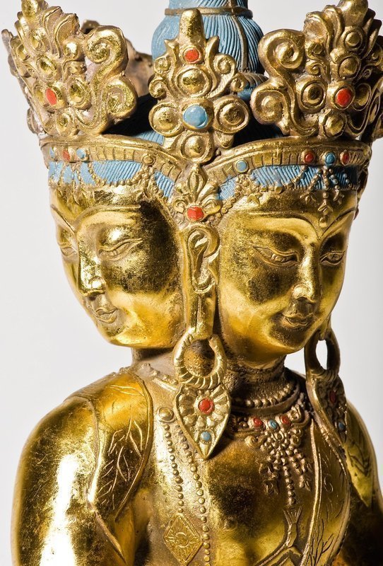A large 4-headed gilt bronze Qing Amitayus Buddha