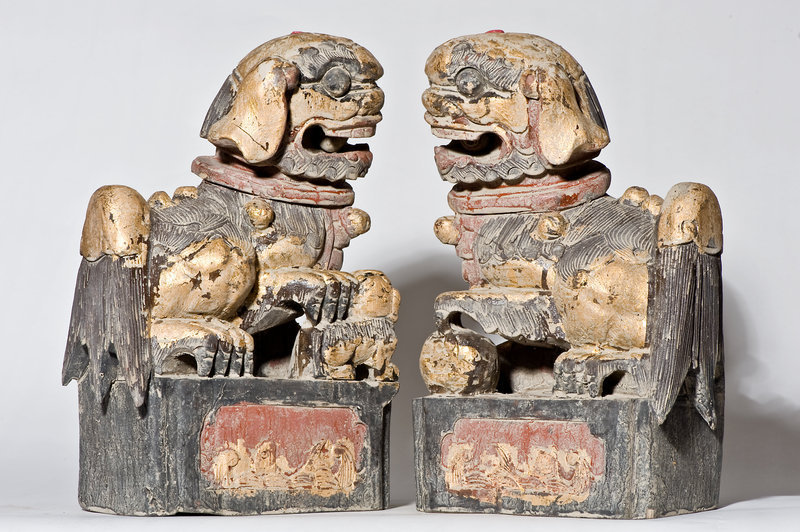 Pair of Qing period Chinese wood carved Foo Dogs