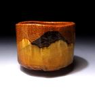 Masterpiece Faceted Amber-Glazed Raku Chawan by Shoraku Sasaki