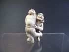 Japanese Netsuke of a Man Wrestling an Oni, SIgned Mitsusada