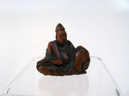 Japanese Wooden Netsuke of a Seated Nobleman by Masayuki,