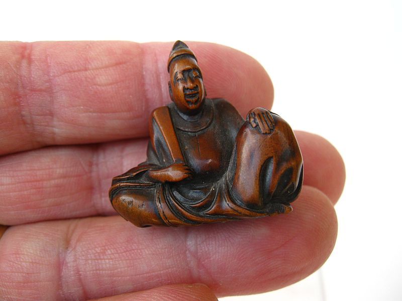 Japanese Wooden Netsuke of a Seated Nobleman by Masayuki,