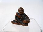 Japanese Wooden Netsuke of a Mask Maker by Ryuraku, Signed