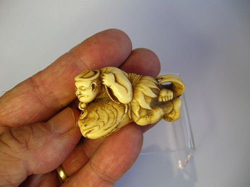 Japanese Netsuke of a Fisherman With His Catch, by Yoshinao