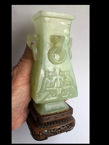 Chinese Green Jade Vase on a Wooden Stand