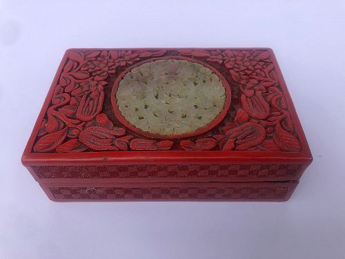 Chinese Carved Cinnabar Box With a Jade Insert