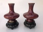 Pair of Miniature Chinese Porcelain Sang de Boeuf Vases on Stands