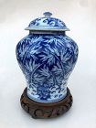 Chinese Porcelain Lidded Jar on a Bamboo Stand