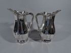 Pair of French Belle Epoque Classical Silver Water Pitchers