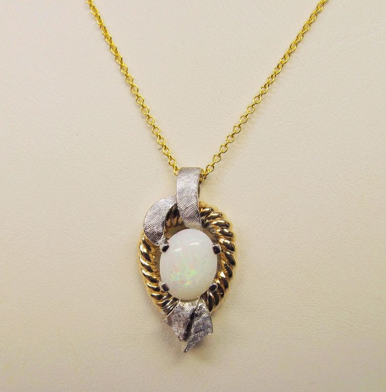 Oval Opal Pendant in Yellow and White Gold