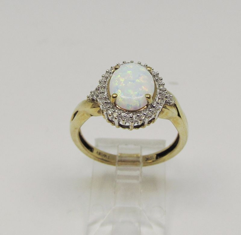 Opal and Diamond Oval Cluster Ring