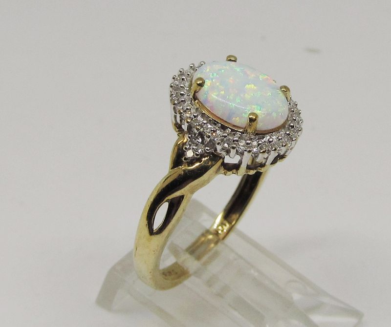 Opal and Diamond Oval Cluster Ring