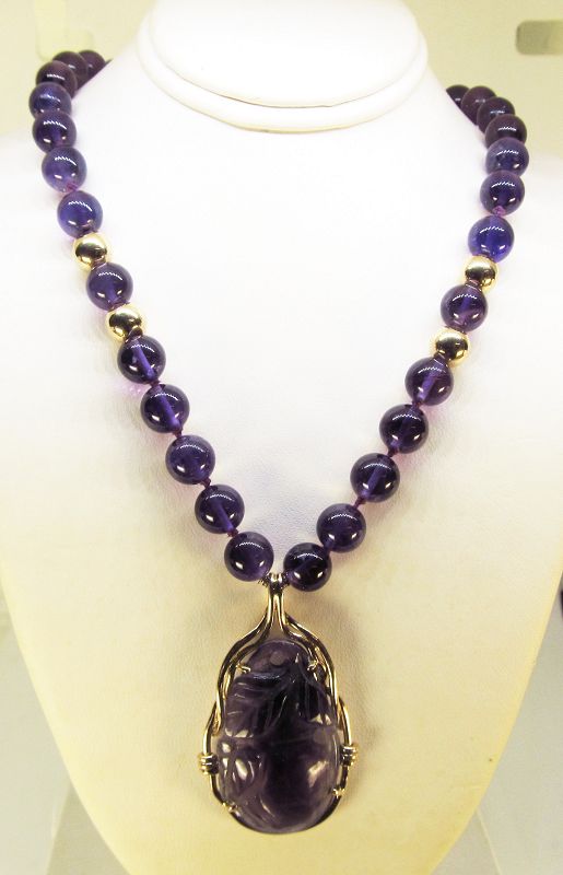 Carved Amethyst and 14Kt Gold Pendant on an Amethyst Necklace