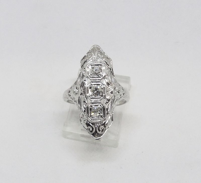 1920-s 18Kt White Gold Filigree and Diamond Dinner Ring