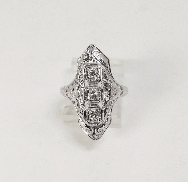 1920-s 18Kt White Gold Filigree and Diamond Dinner Ring