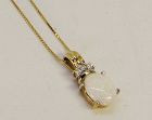 Opal and Diamond Pendant with 18” Chain 14Kt Yellow Gold