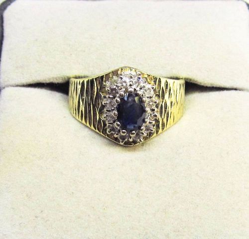 14 Kt two-tone Gold, Sapphire and Diamond Cluster Ring