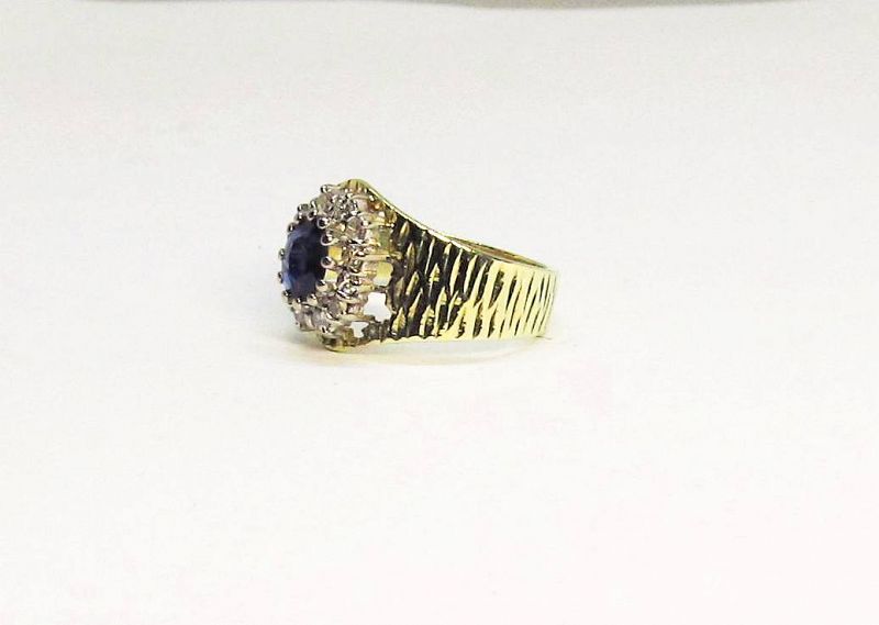 14 Kt two-tone Gold, Sapphire and Diamond Cluster Ring