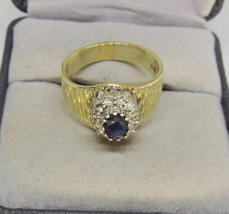 14 Kt two-tone Gold, Sapphire and Diamond Cluster Ring