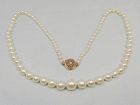 Cultured graduated pearls 14Kt gold and diamond clasp