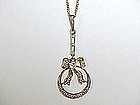 14Kt Gold Diamond and Seed Pearl Bow Pendant Lavaliere