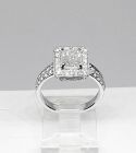18 Kt Gold and Emerald Cut Diamond Engagement Ring