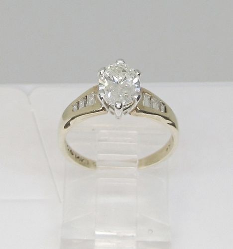Oval Diamond Engagement Ring in 14 Kt Gold Setting
