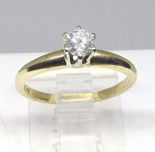 Diamond Solitaire Ring in Two Tone Gold Setting