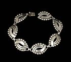 Hector Aguilar Mexican 940 silver "masks" Bracelet