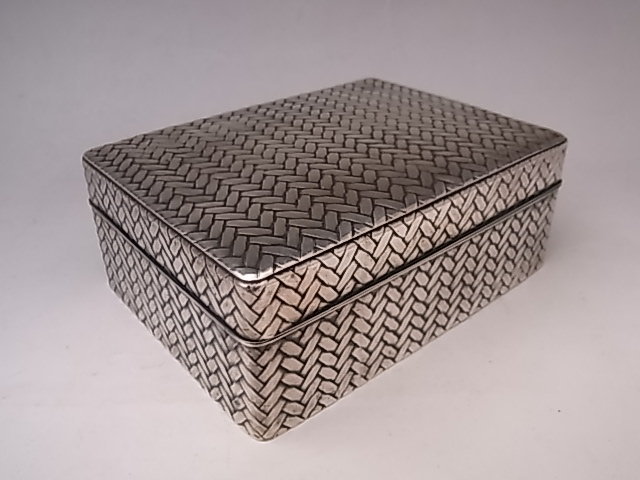 Japanese E. 20th C. Pure Silver Box with Woven Design