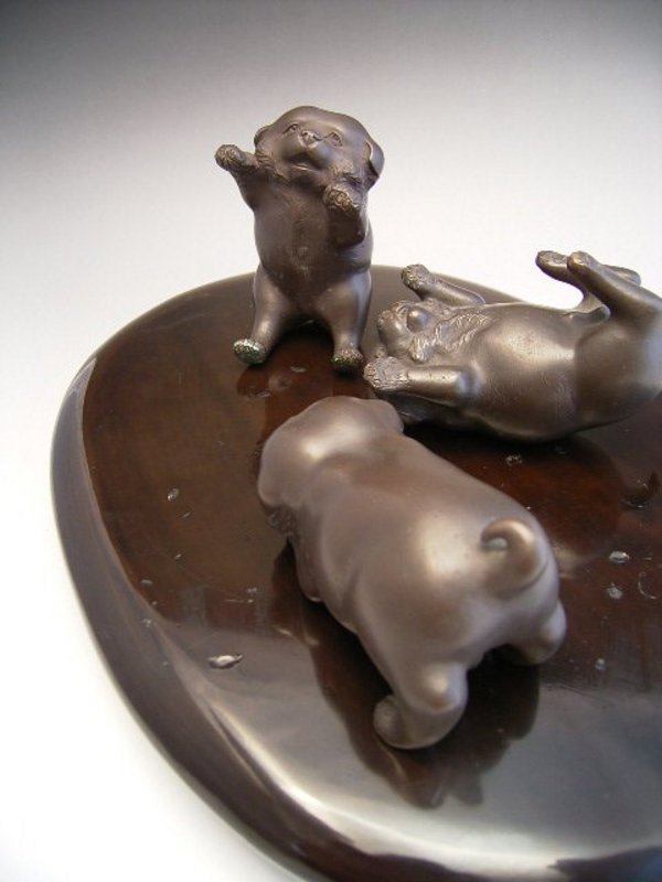 Japanese E 20th century bronze trio of puppies by Kozan