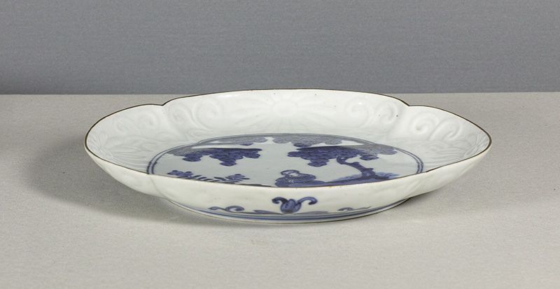 A Japanese Arita Mokko Dish, 18th Century.