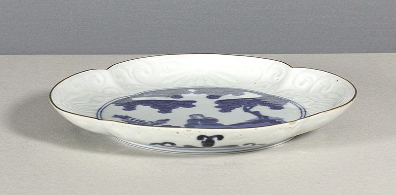 A Japanese Arita Mokko Dish, 18th Century. (2)