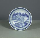 A Chinese “Master of the Rocks” Saucer Dish, Kangxi, late 17th century