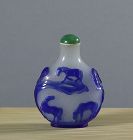 A Fine Chinese Carved Blue Overlay Glass Snuff Bottle, 1800~1850.