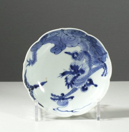 A Japanese Arita lobed dish decorated with a dragon descending. #3