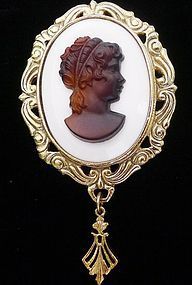 Brooch with Dark Cameo on White Glass
