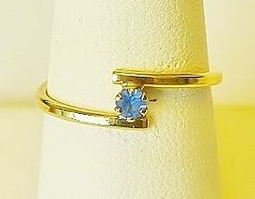 Gold Toned Ring with Tiny Sapphire Glass - Childs"???