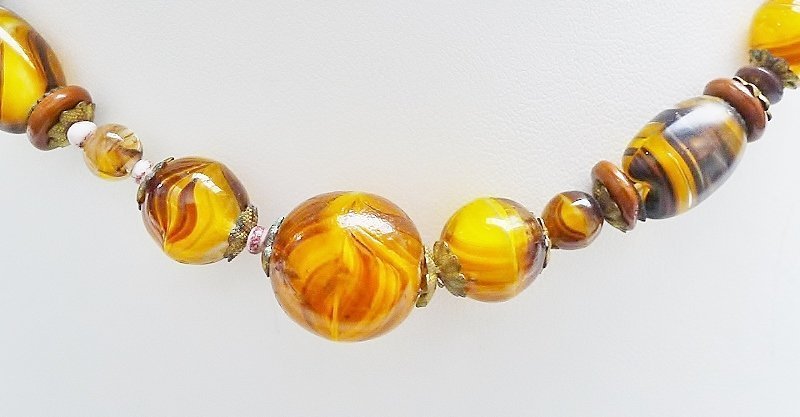 Lovely String of Glass Graduated Tiger's Eye Beads