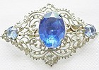 Silver Filigree Brooch with Blue  Rhinestones