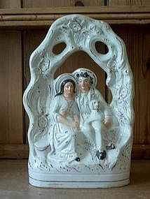 Staffordshire Figure of a Man,Woman and Dog