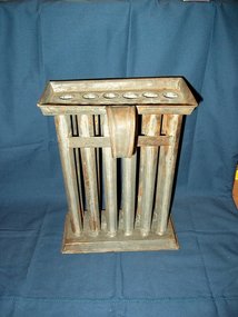 A Country Primitive Tin 12-Candle Wax Mold