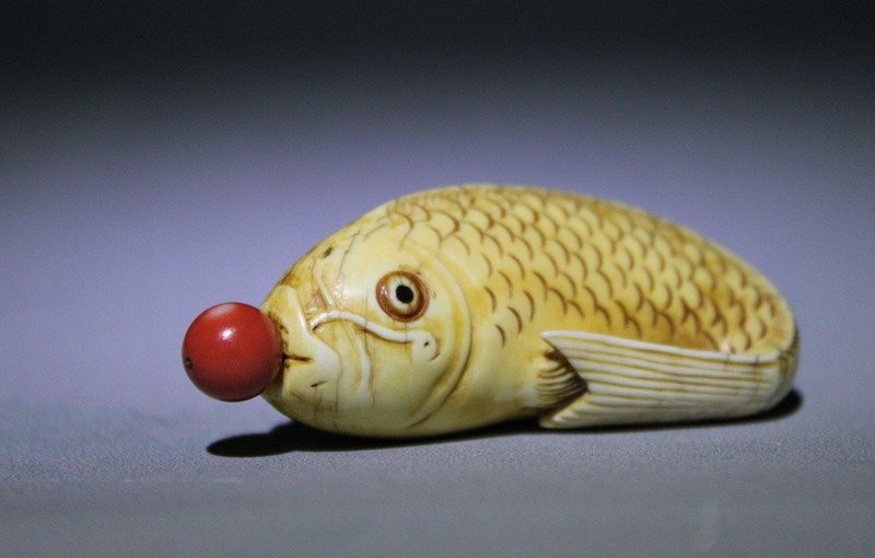 An Ivory Fish-Shaped Snuff Bottle of Qing Dynasty