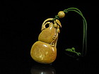 An Ivory Pendent in Double Gourd Form