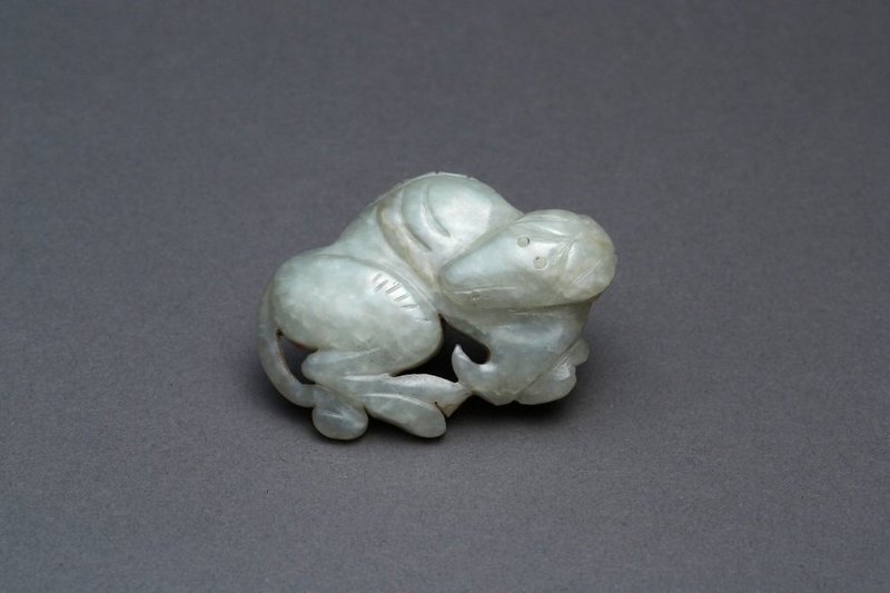 A Charming Houtien Jade Carving of A Dog.