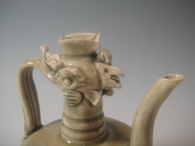 A Celadon Ewer Pot with Phoenix Head.