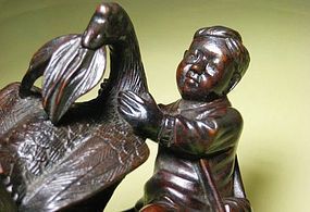 A Lovely Wood Carving of A Child & A Goose