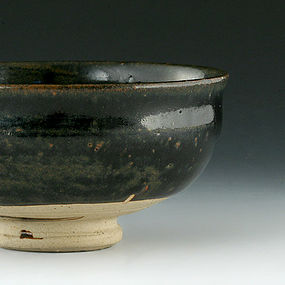 A Black-Glazed Tea Bowl in Unique form